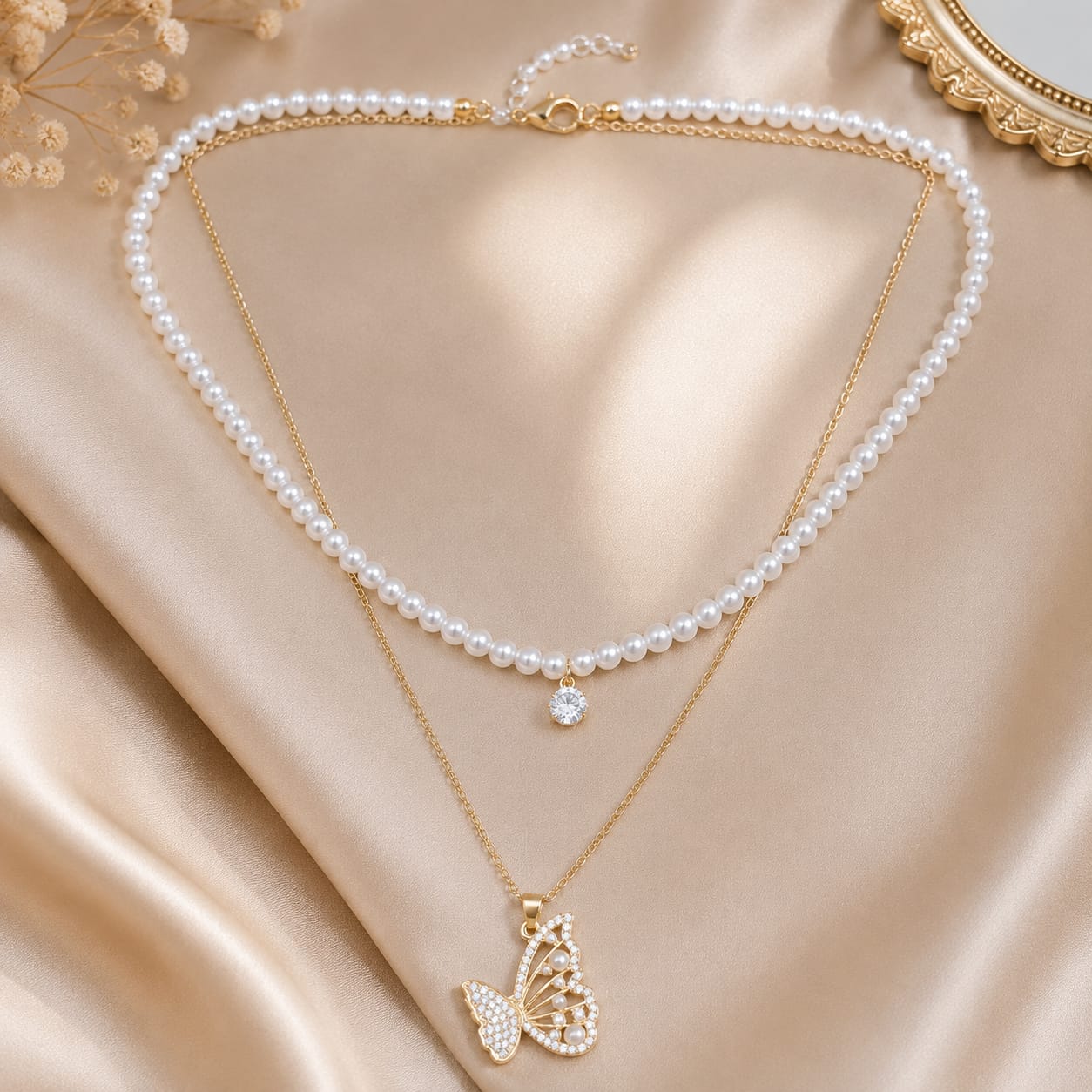 A stylish double-layer pearl necklace with elegant pendant designs for a timeless look-4